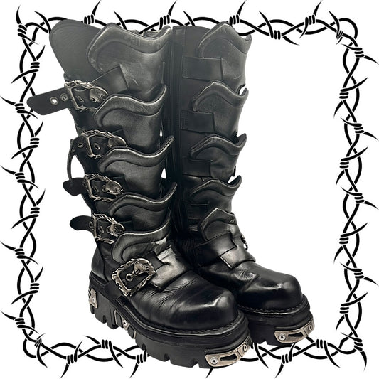 Black leather boots with buckles on a white background with barbed wire border