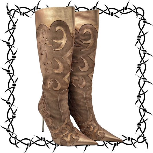 Pair of brown cowboy boots with intricate designs on a white background with barbed wire border.